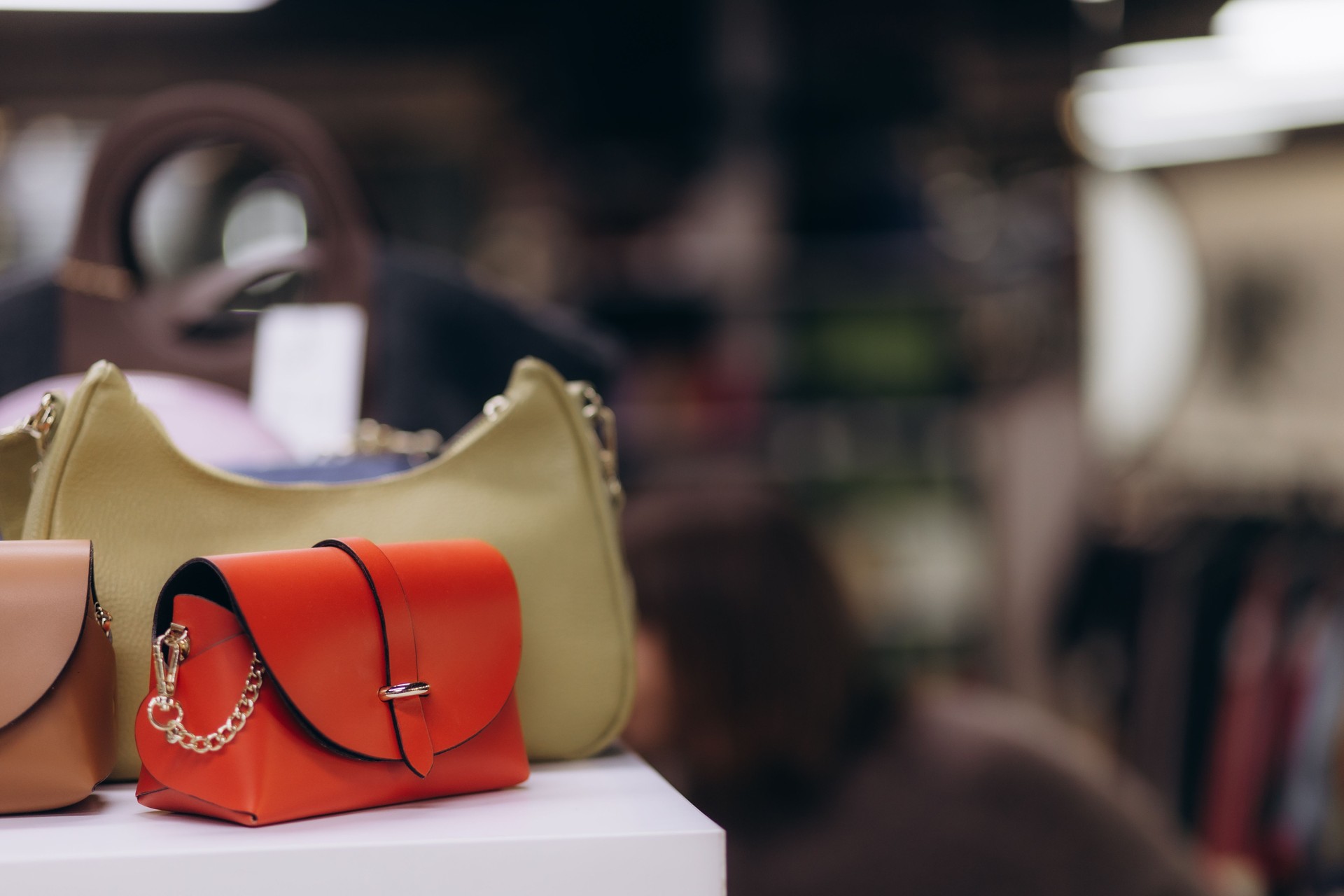Elegant Handbags Displayed in a Fashionable Boutique Setting